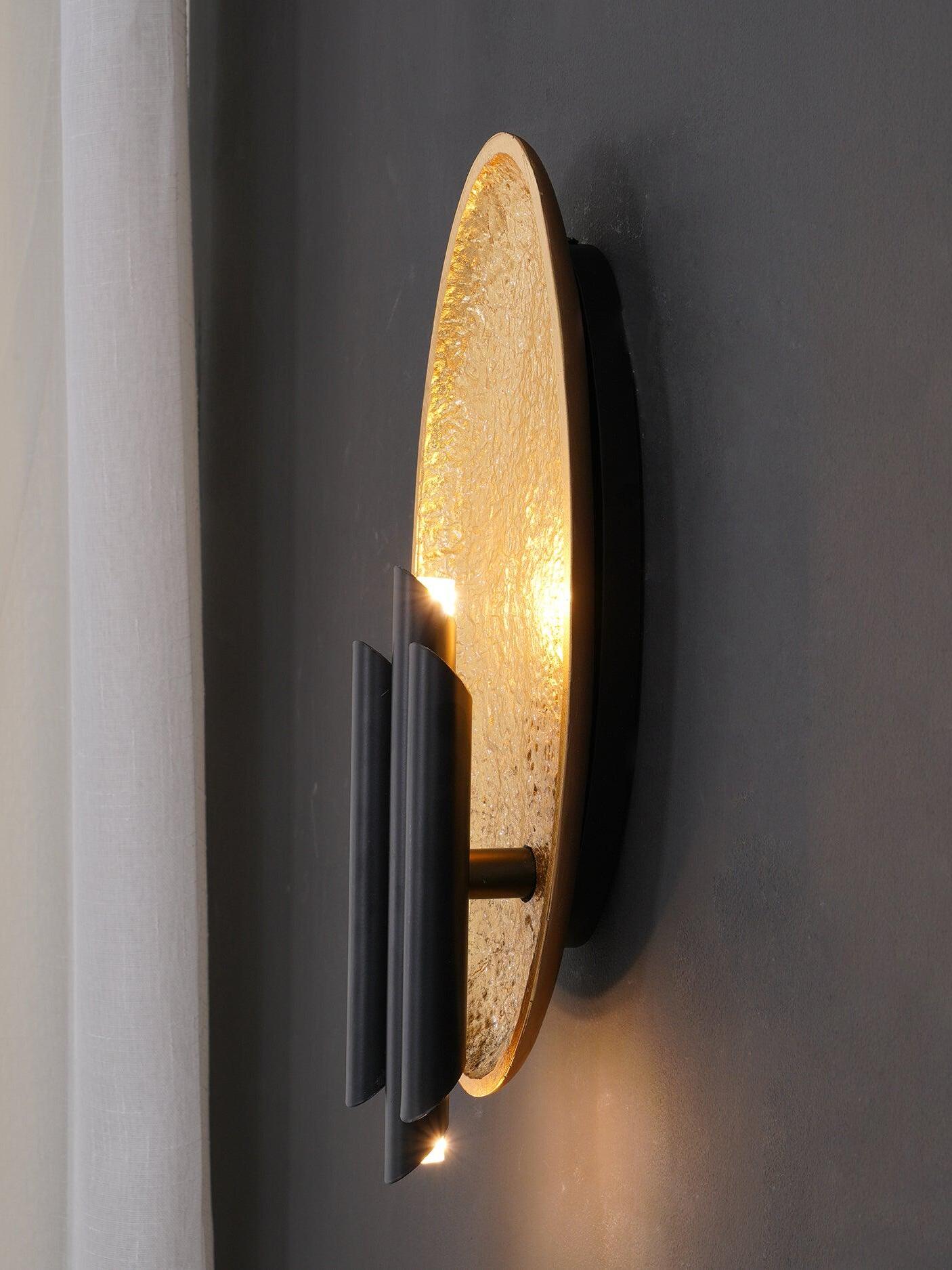 Side view of curved textured panel and spaced dark tube cluster