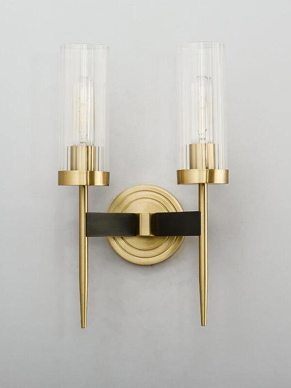 Two-arm wall sconce with clear ribbed cylinders