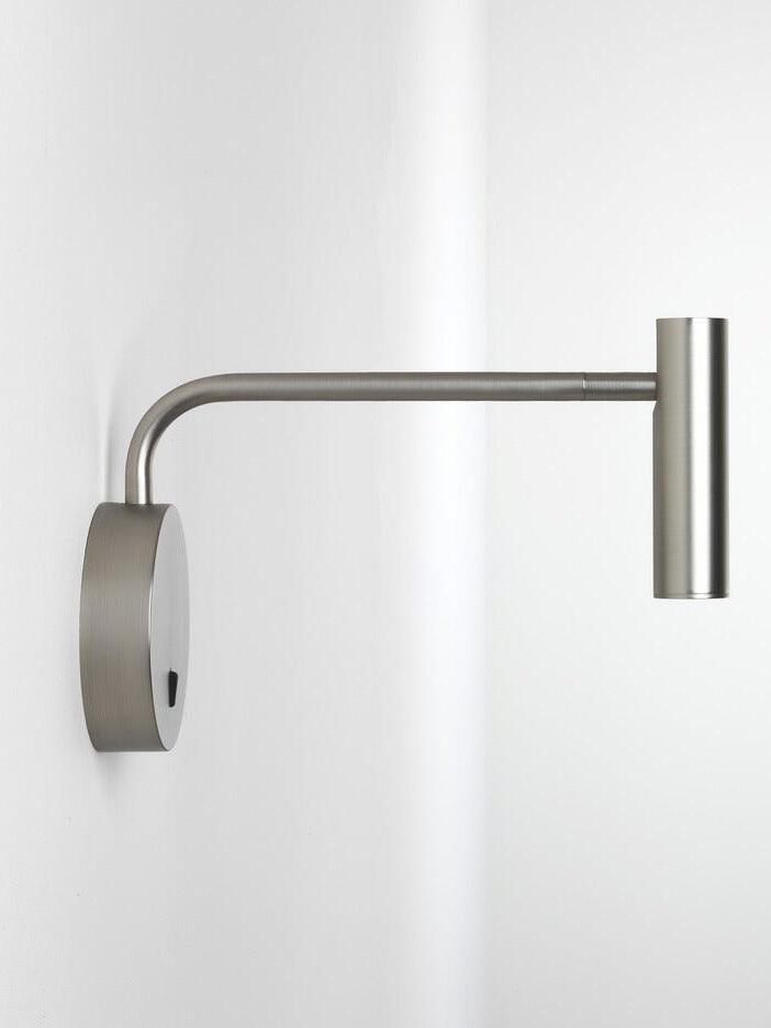 Side view of nickel-coloured reading arm and plate