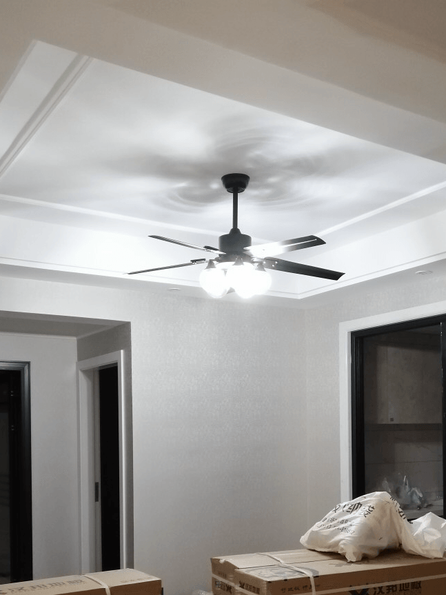 Ceiling fan chandelier in a living room