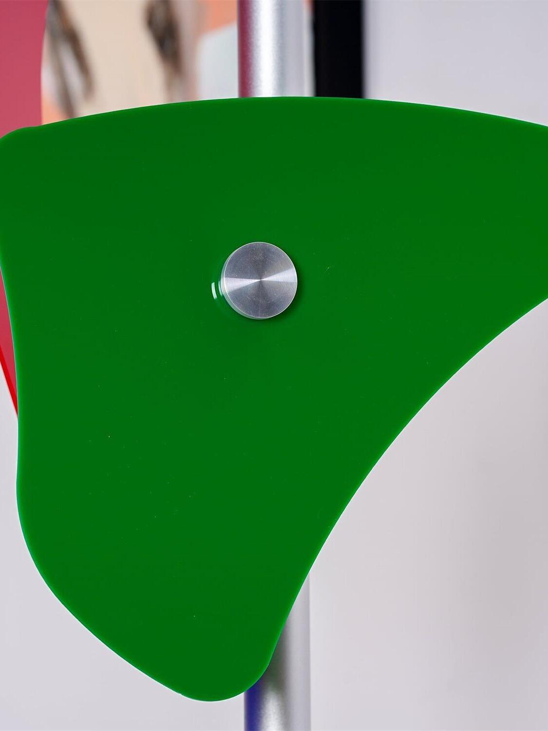 Green panel and central metal fastener