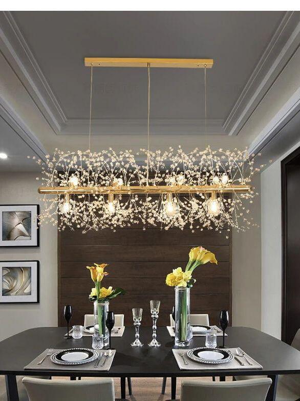 Gold chandelier over a set dining table