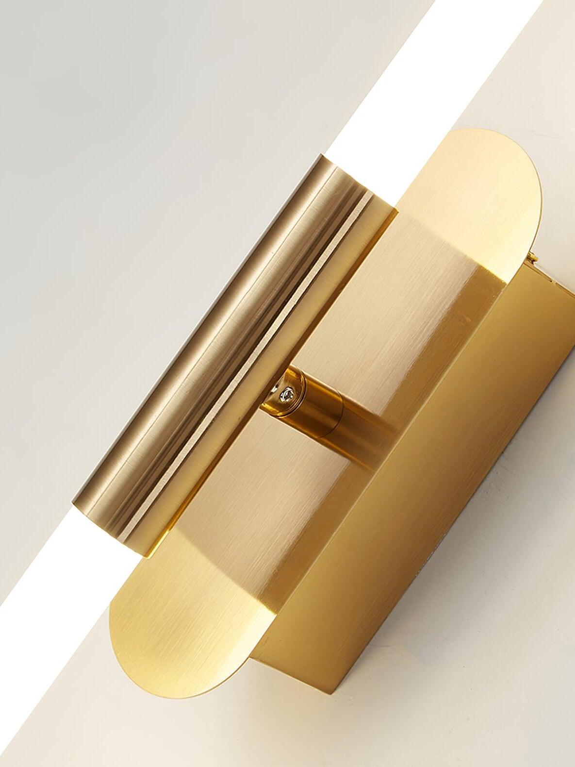 Close-up of the gold Agnes central tube fitting, pivot connection and rounded wall plate