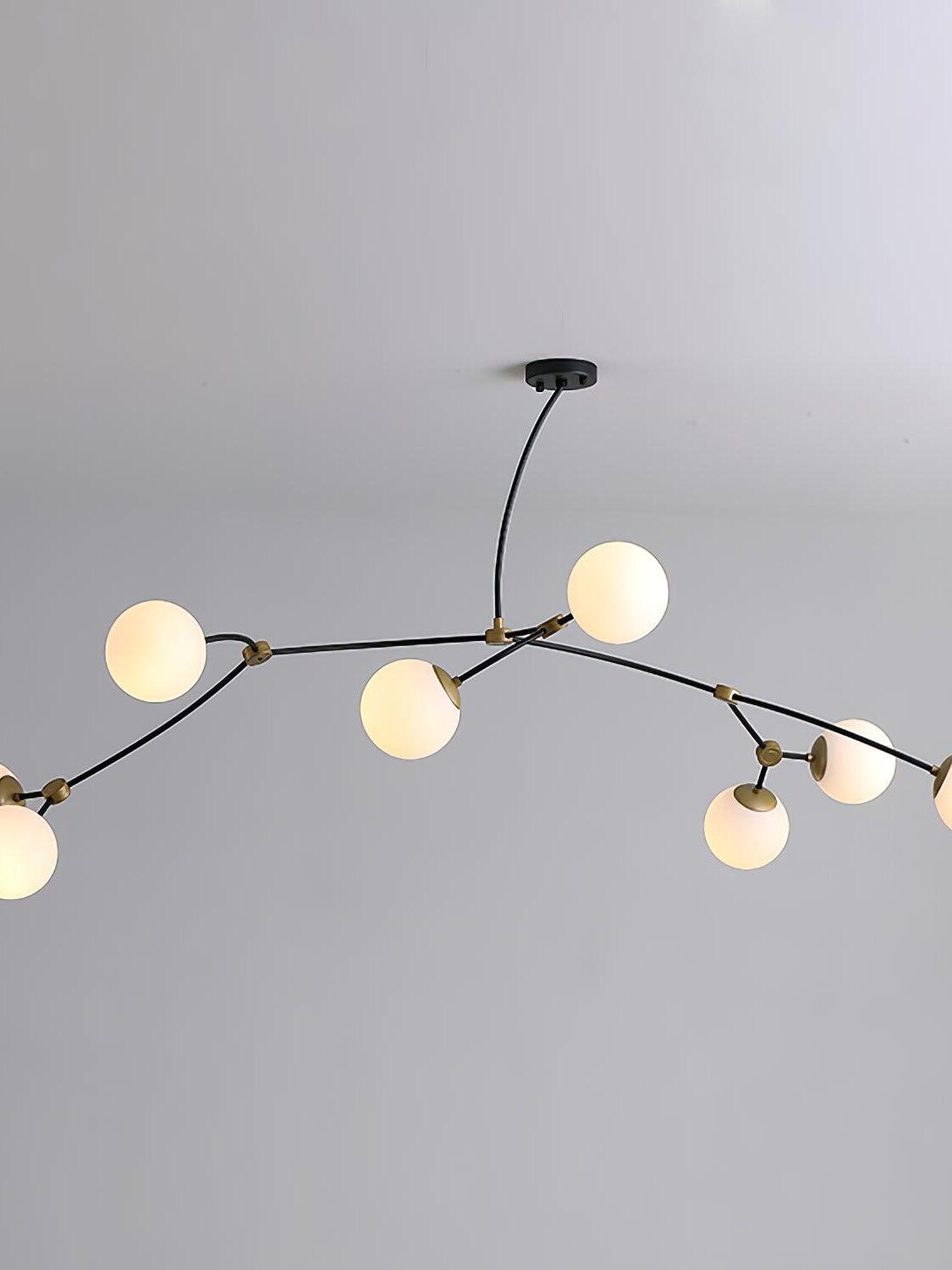White globes along a wide curved black frame