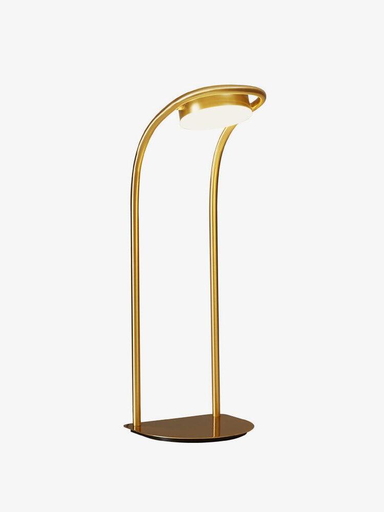 Forward-curved brass LED table lamp on round base