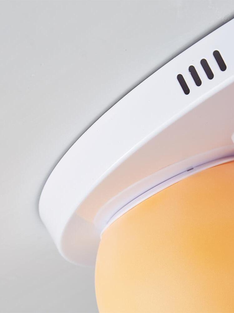 Vent openings along the edge of the white ceiling plate