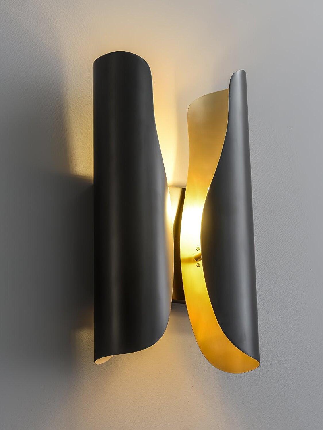 Side angle of the curved Blackened sconce