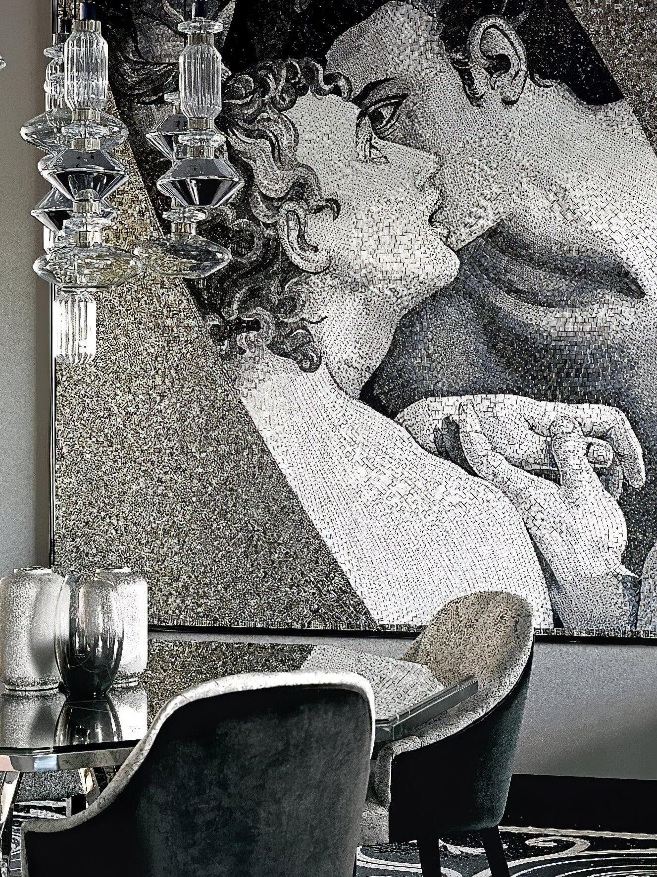Grouped clear and smoky pendants before monochrome portrait