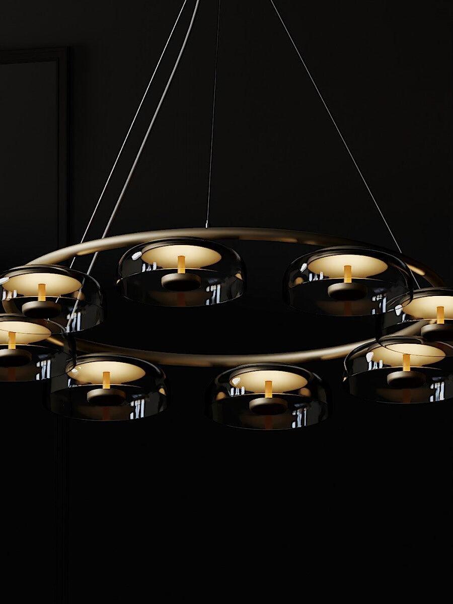 Blossi chandelier illuminated against a black background