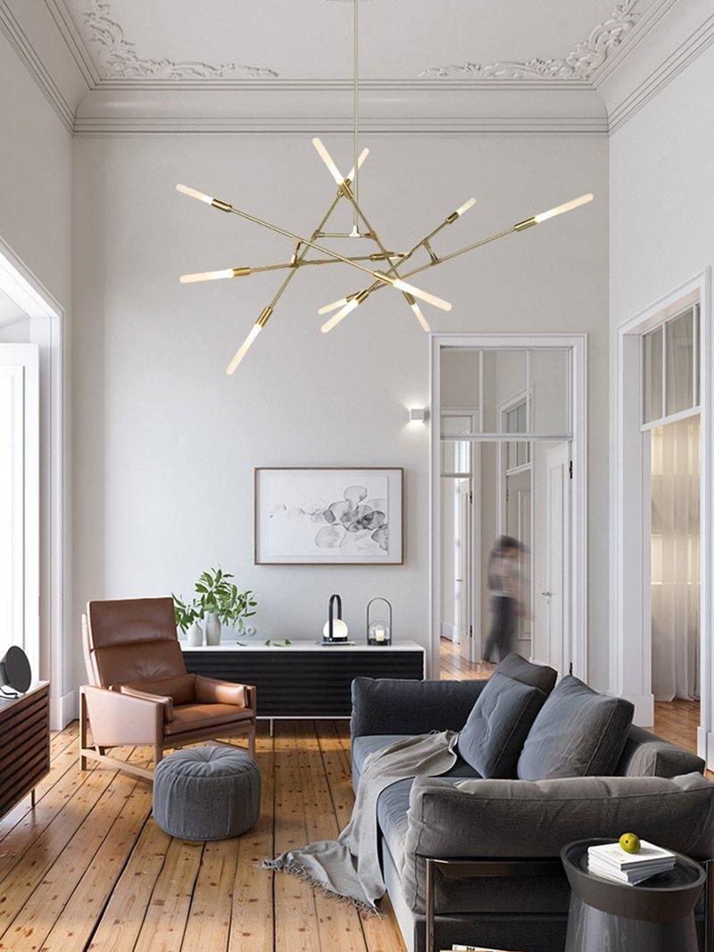 Gold multi-arm chandelier in a bright sitting room