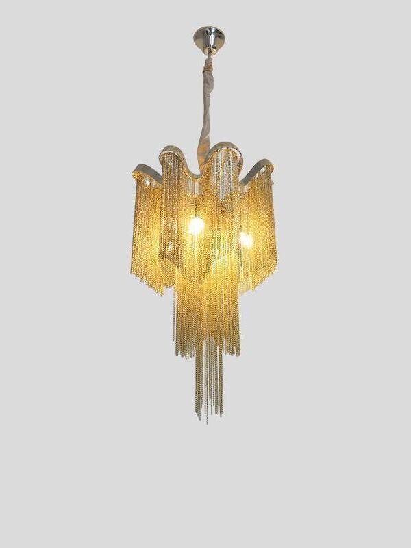 Gold-coloured Stream chandelier with glowing chain fringe and undulating tiers