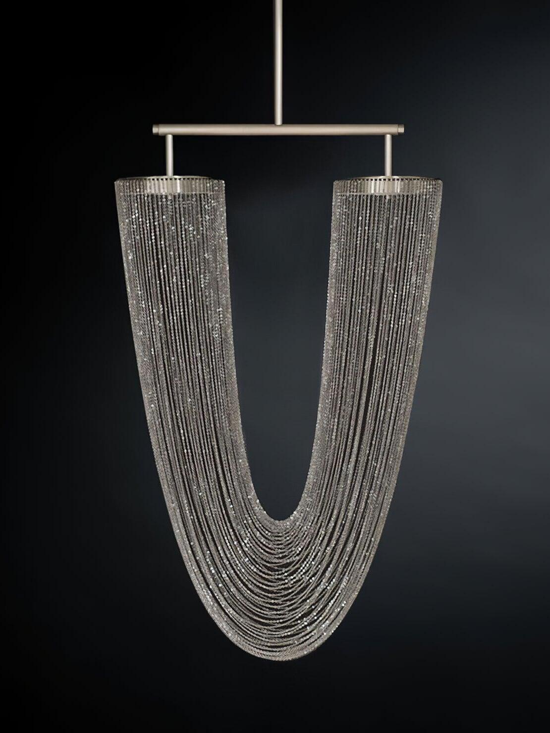 Pale metal chains draped below a horizontal support bar