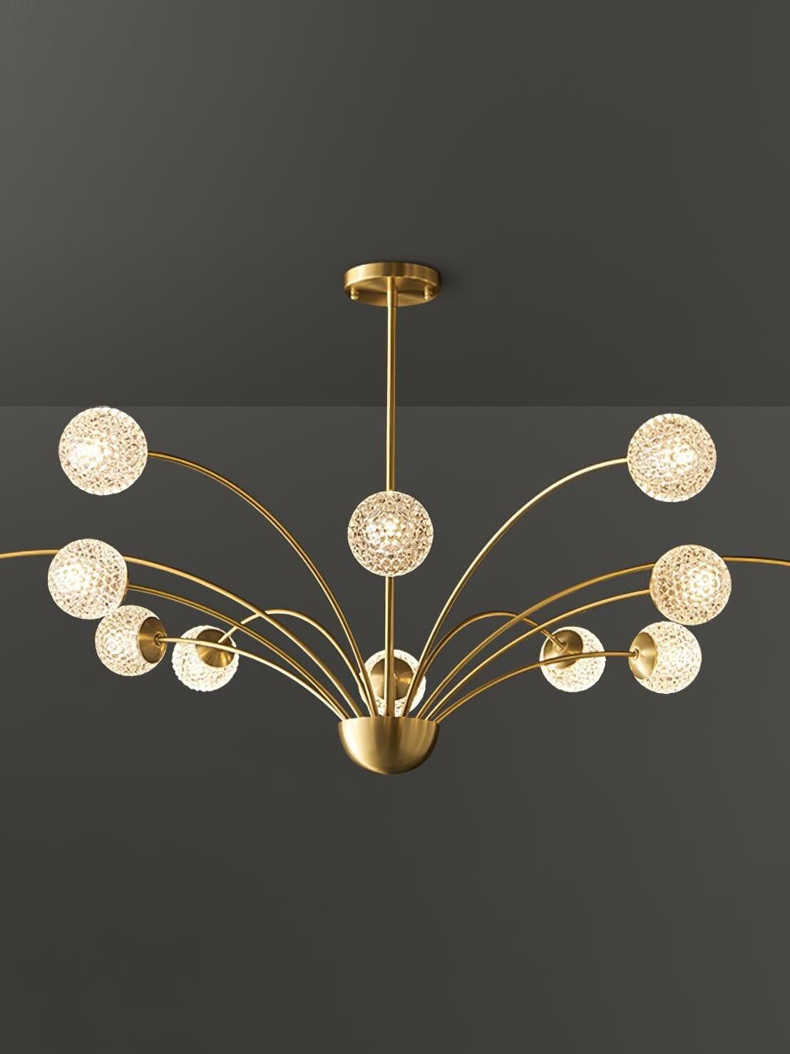 Broad textured-globe chandelier with a central front globe, brass-tone hub and cropped outer edges