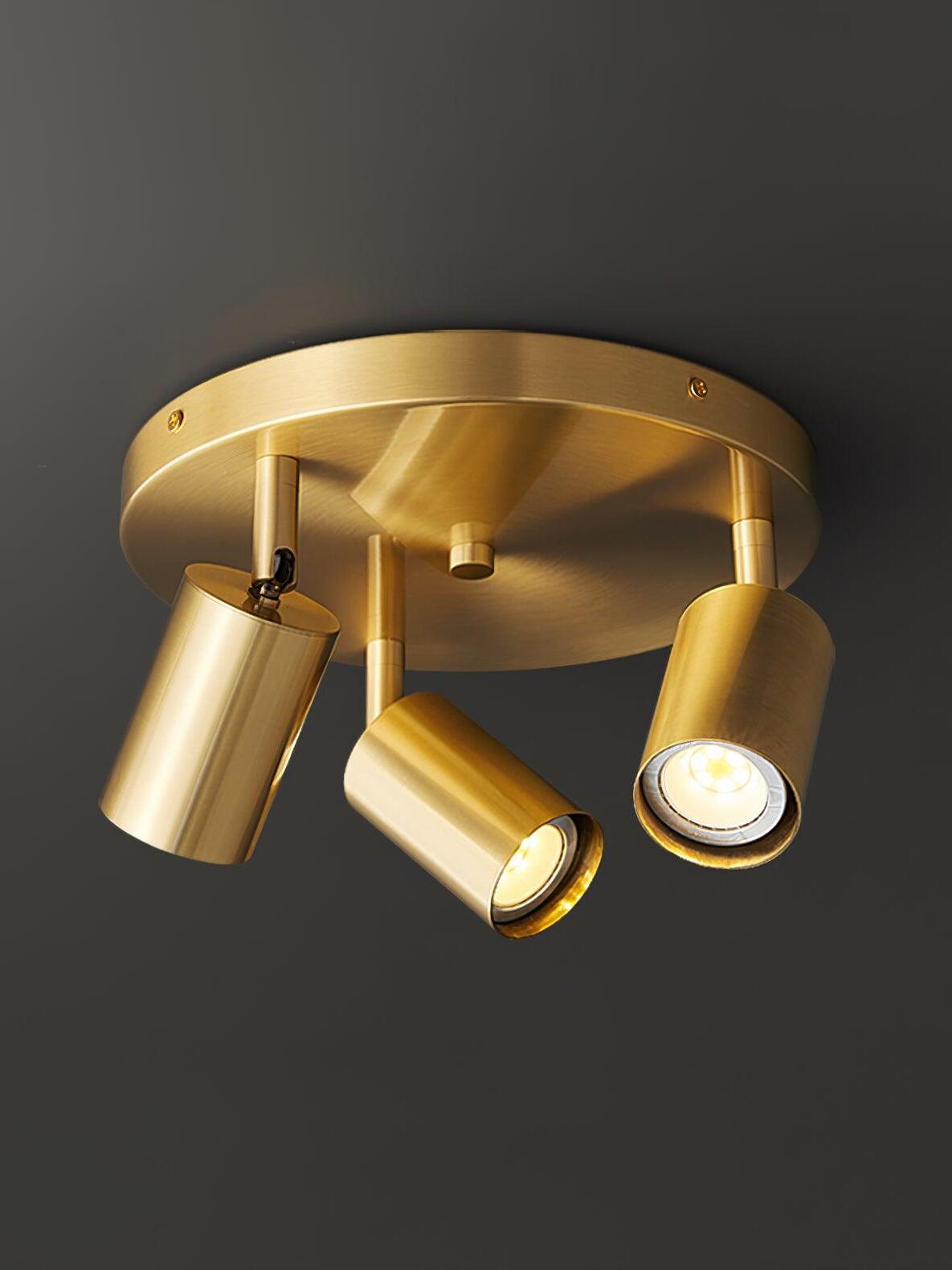 Brass three-head Hugo spotlight on round ceiling plate