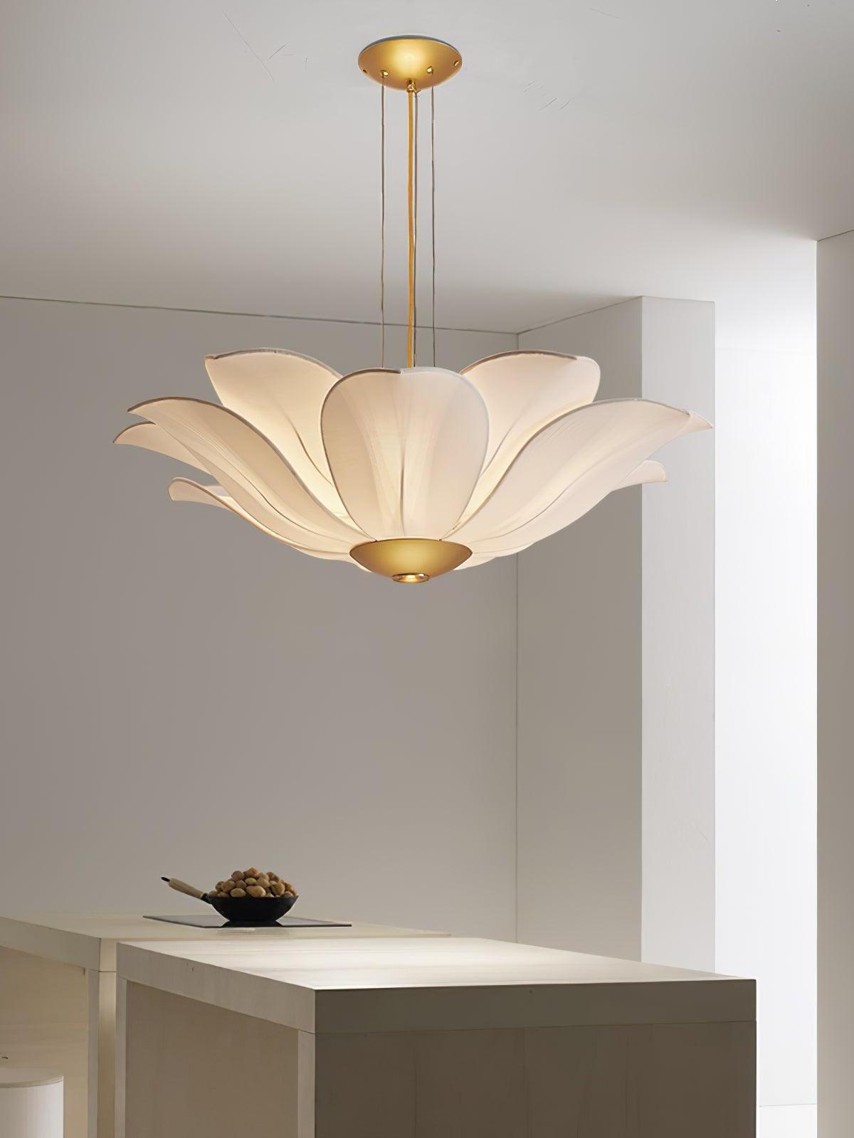 Single flower chandelier hanging above a cabinet