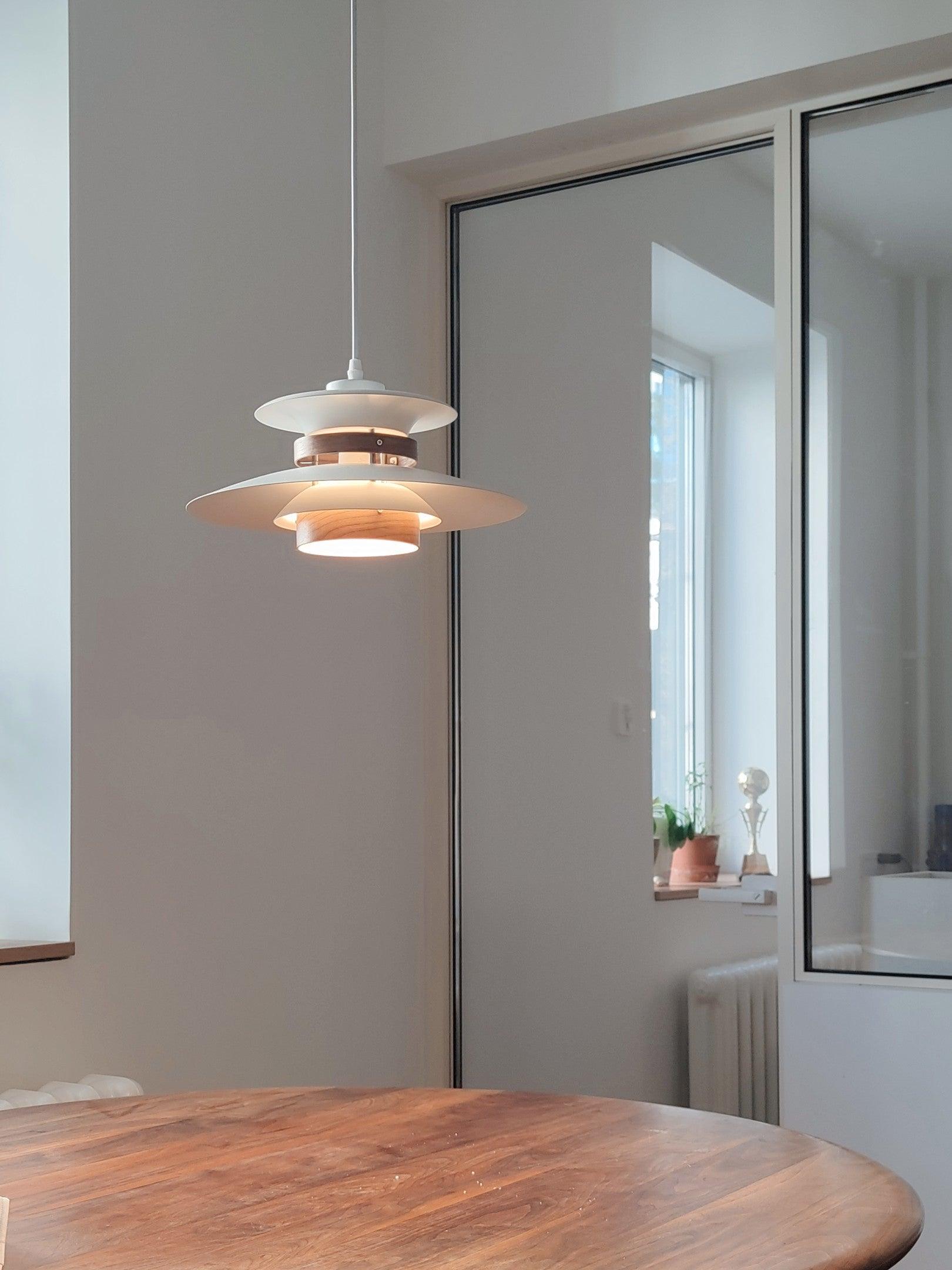 White and wood light beside a window