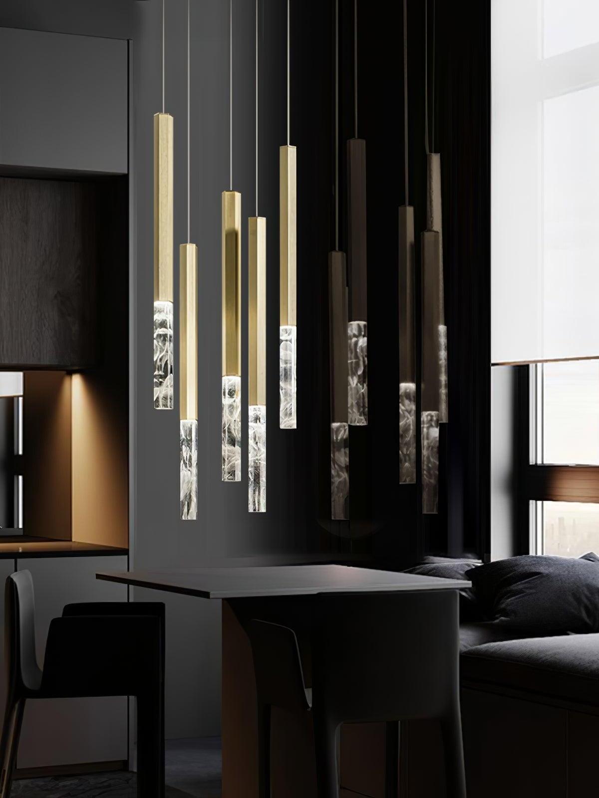 Gold and black vertical crystal lights in an interior