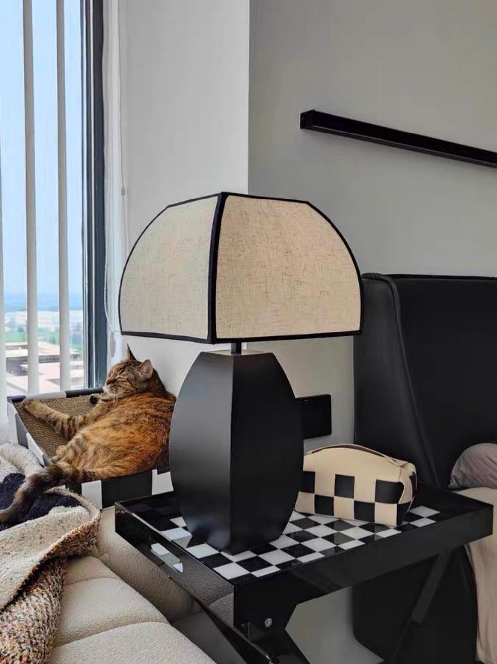 Javier lamp on chequered side table near cat