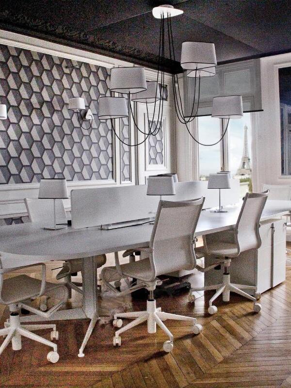 Gallery multi-shade fixture above a long dining table