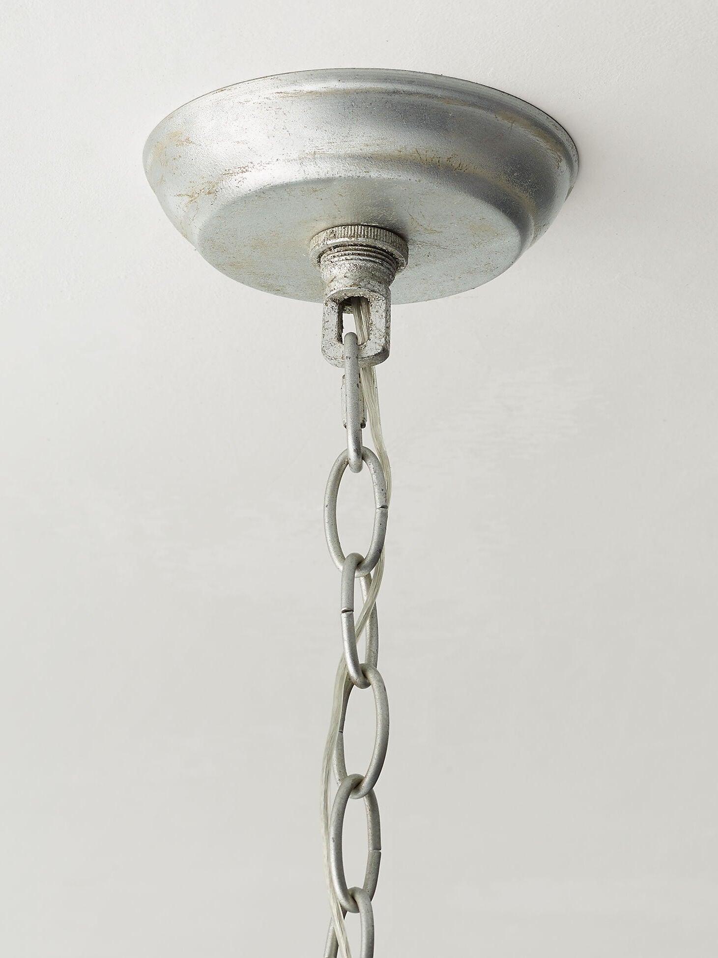 Ceiling canopy and chain hardware of the Skye pendant