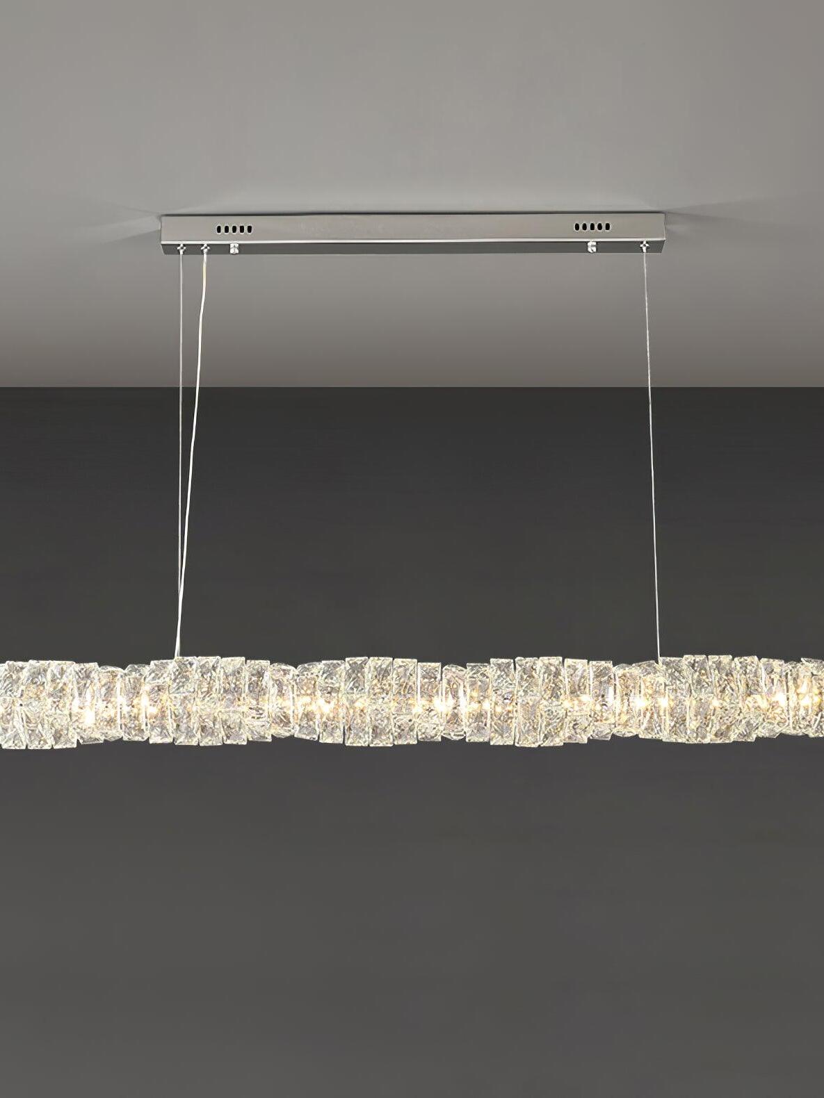 Front view of the chrome canopy and illuminated crystal bar with warm-looking light