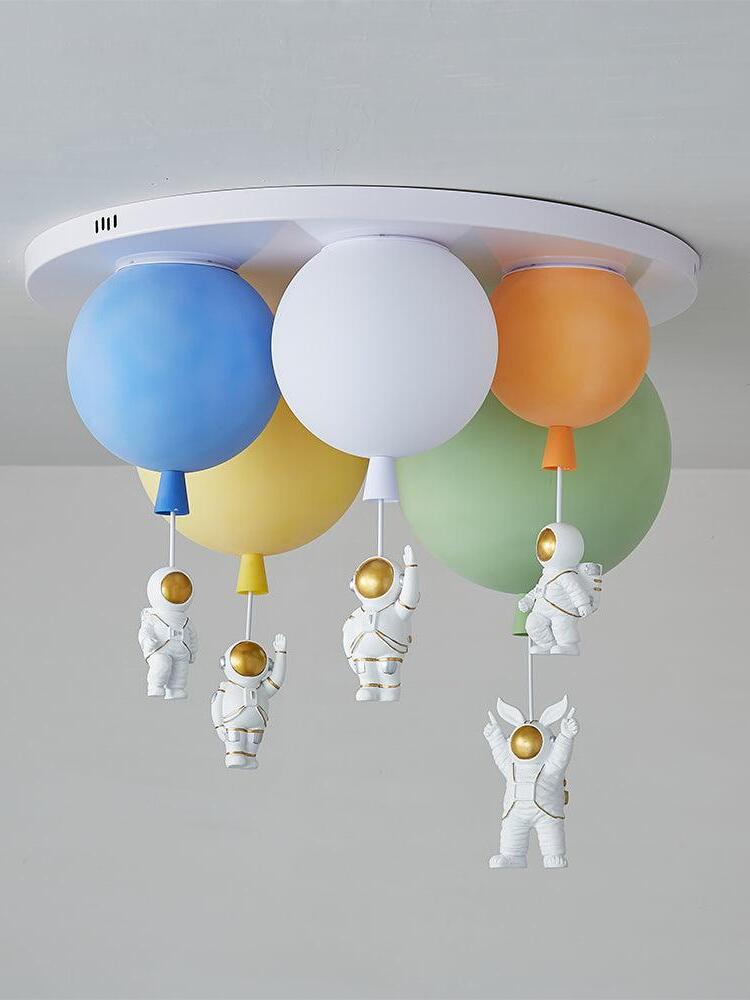 Five-balloon arrangement with blue white orange yellow and green shades