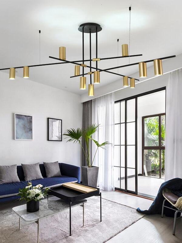 Black and gold-coloured rod chandelier above a living room