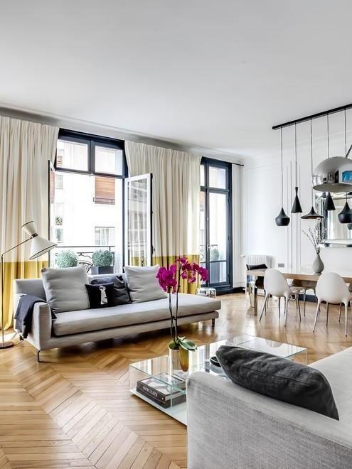 Small black pendant in a bright open living room