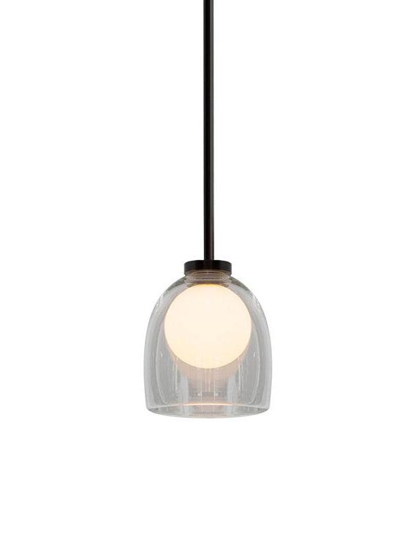 Clear Crux pendant with a glowing sphere and dark cord against a white background