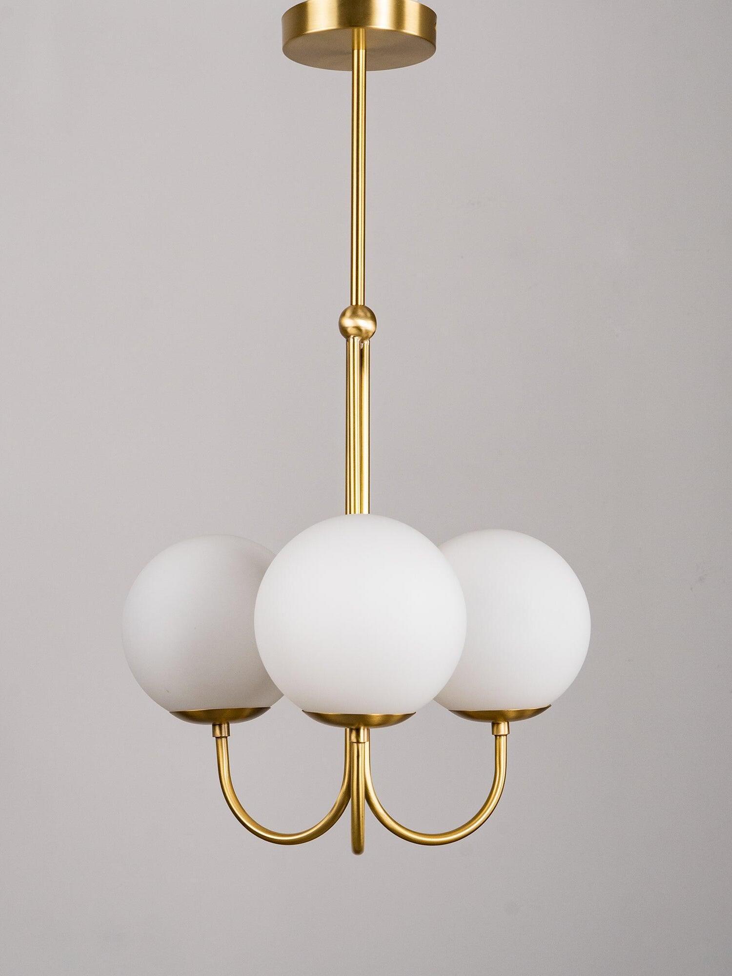 Brass stem and three Opal globes front view
