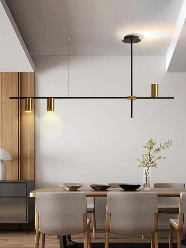 Single-bar chandelier above a dining table