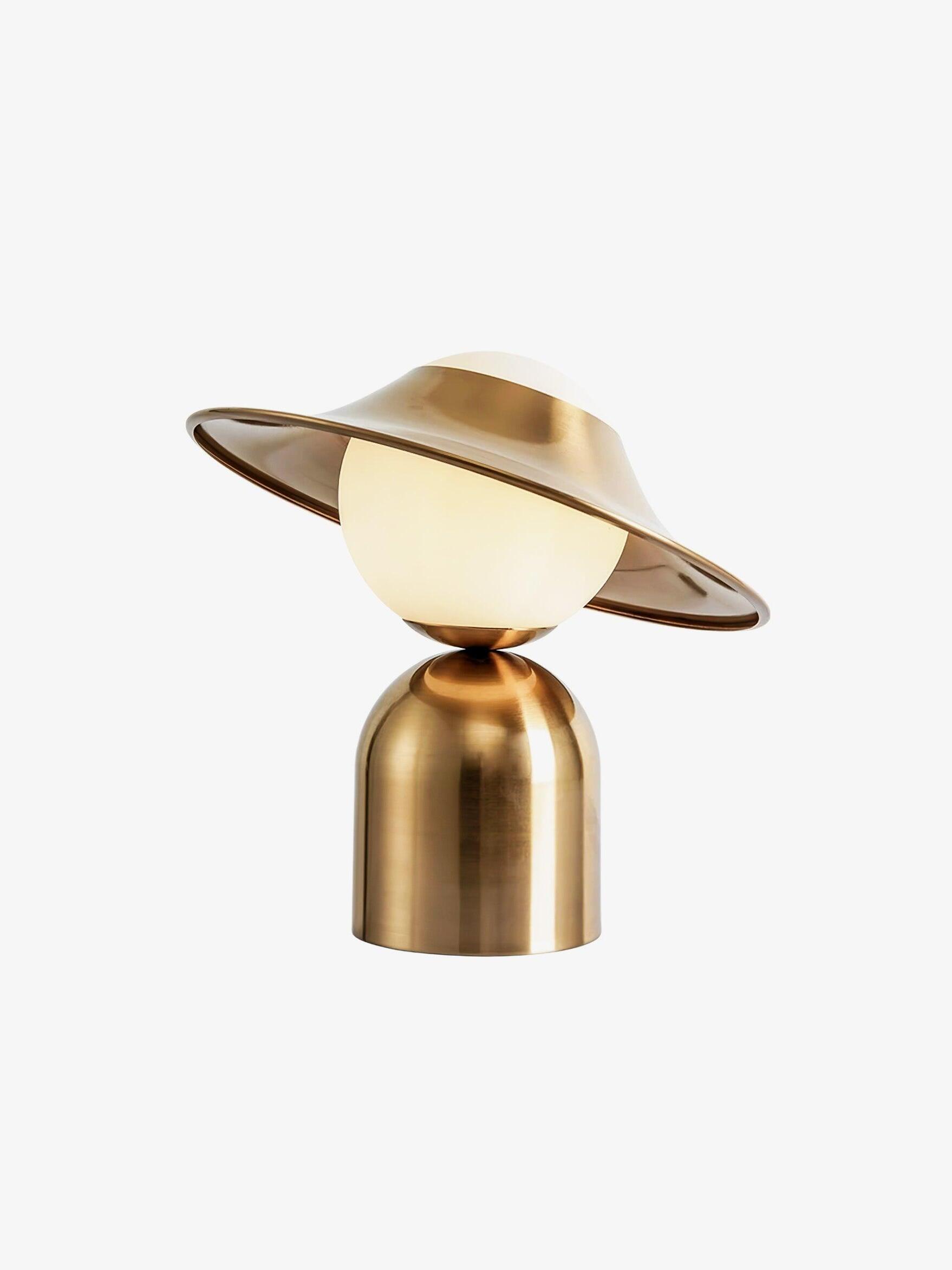 Isolated tilted gold ring around white glass globe lamp