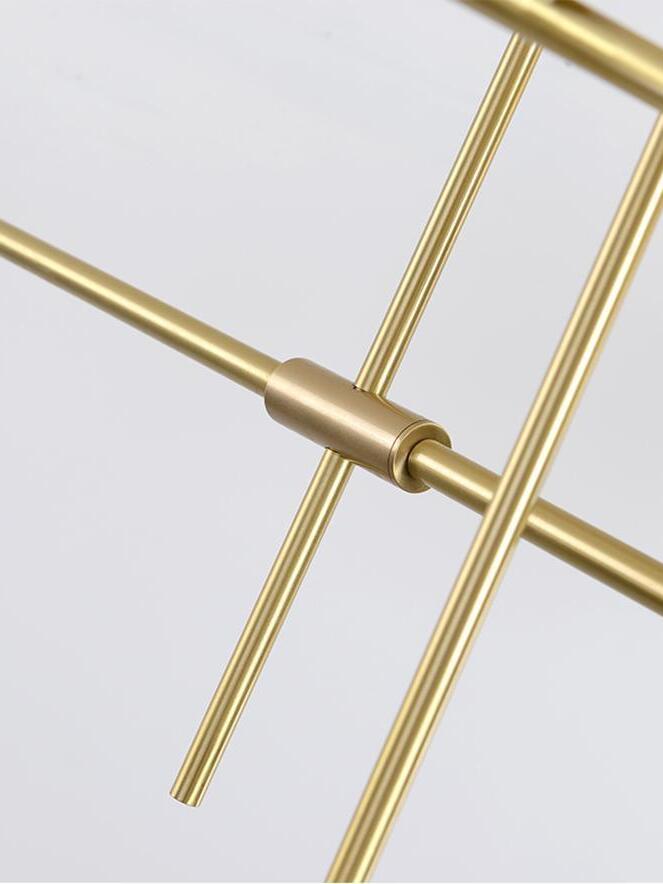 Close-up of intersecting gold-coloured rods