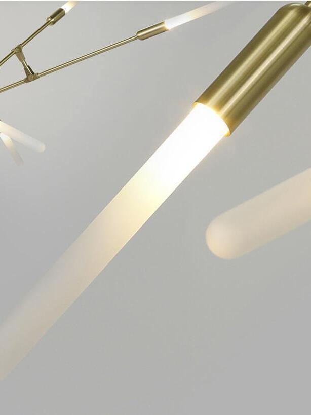 Pale tubular light cover at a Gold arm tip