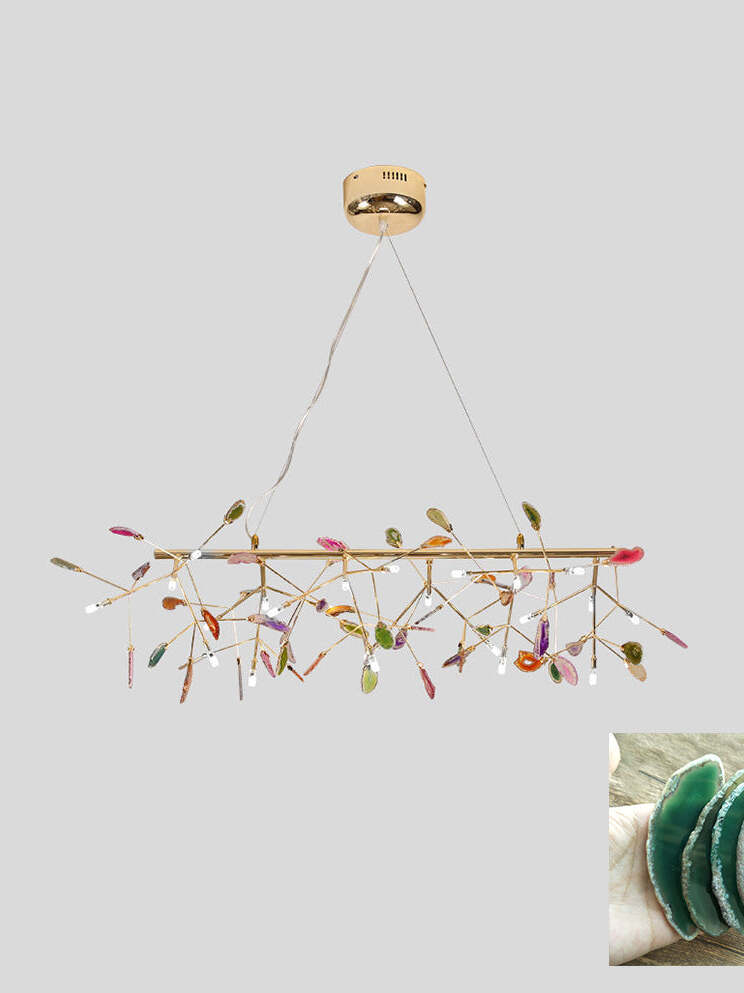 Linear branched reference fixture with green stone inset