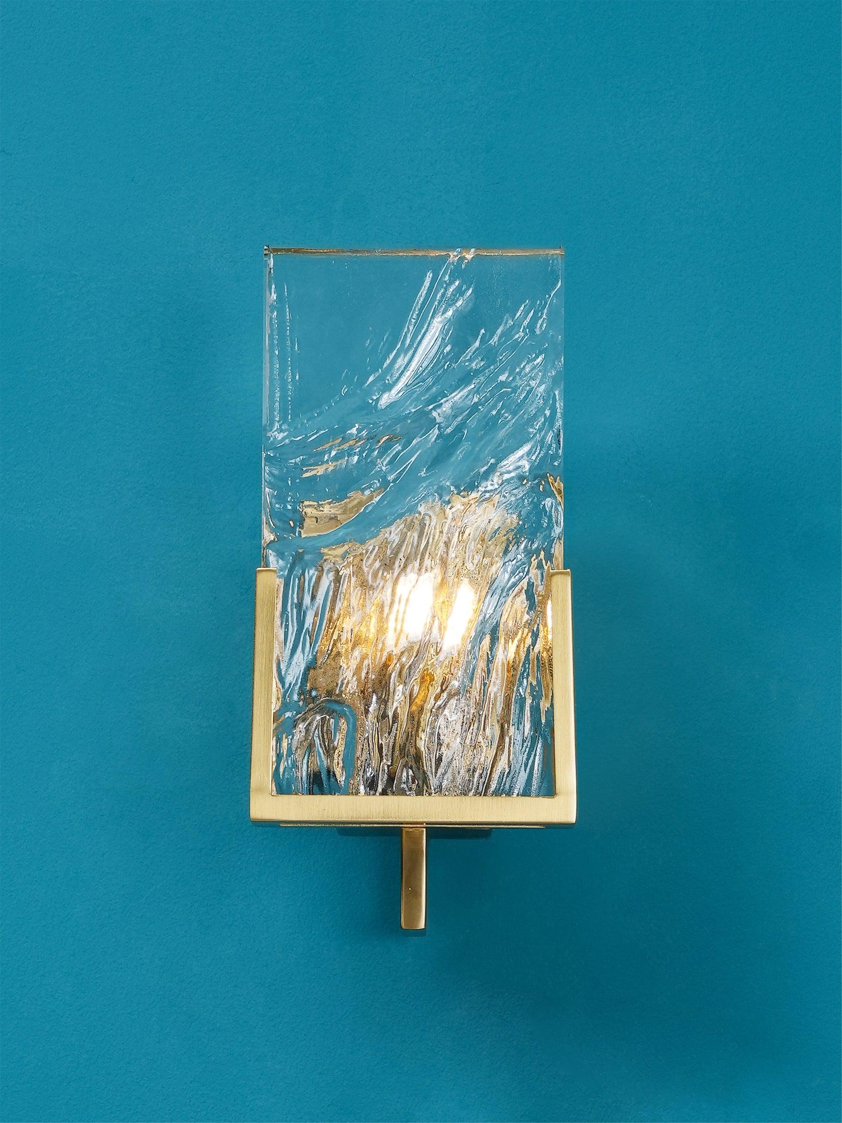 Illuminated Crystal panel against a blue wall