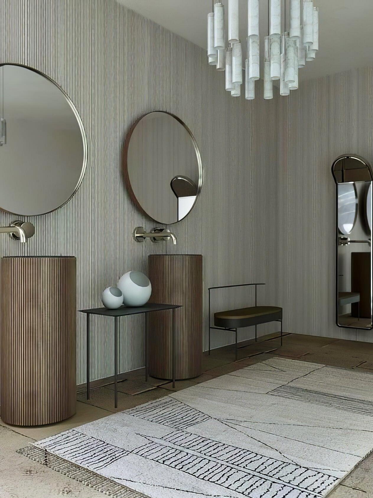 White Silo cluster in a room with wooden console cabinets, round mirrors and pale floor tiles