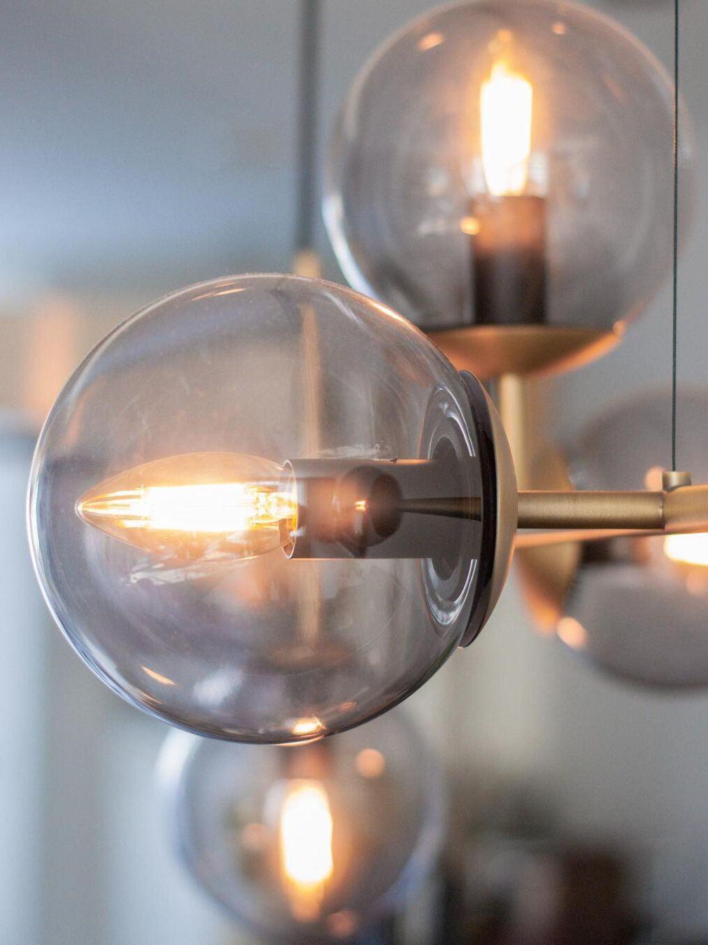 Close-up of glass globe and central bulb fitting