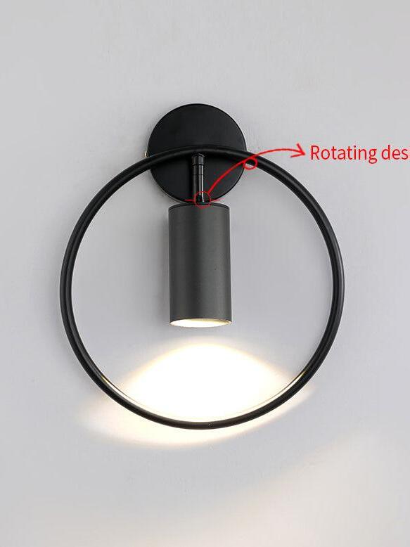 Revolta cylinder head illuminated inside a black ring, with an annotation pointing to the rotating joint.