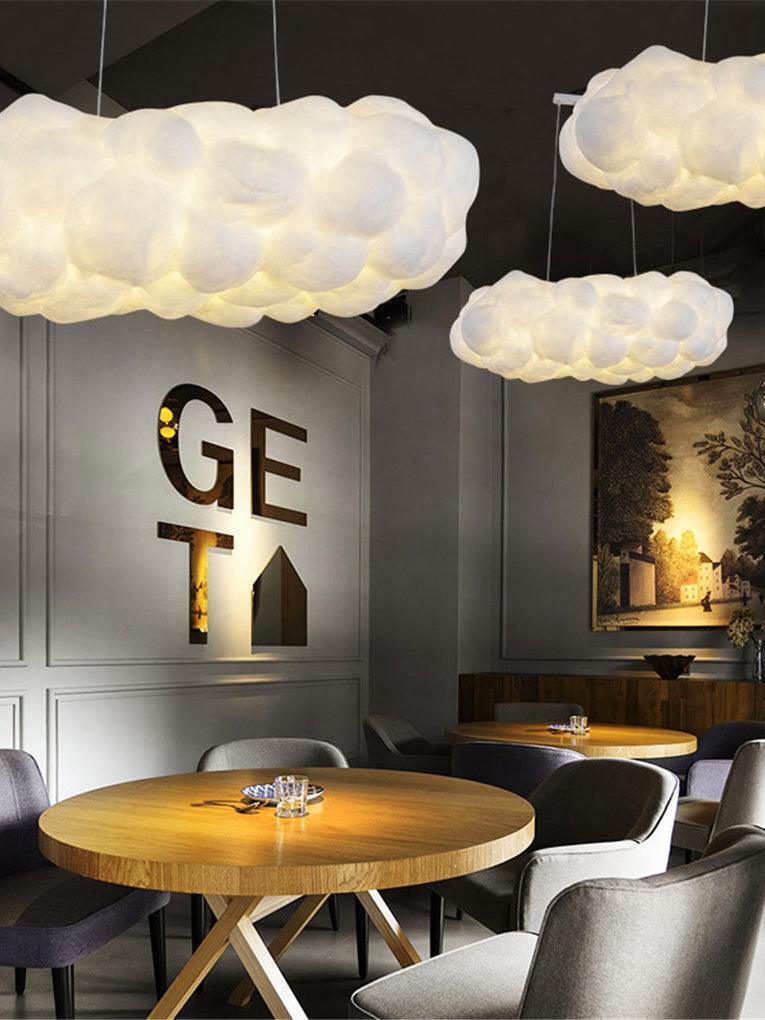 Cloud lights above a round cafe table