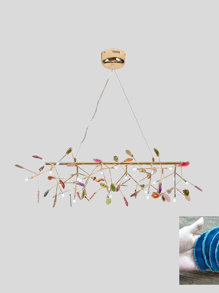 Linear branched reference fixture with blue stone inset
