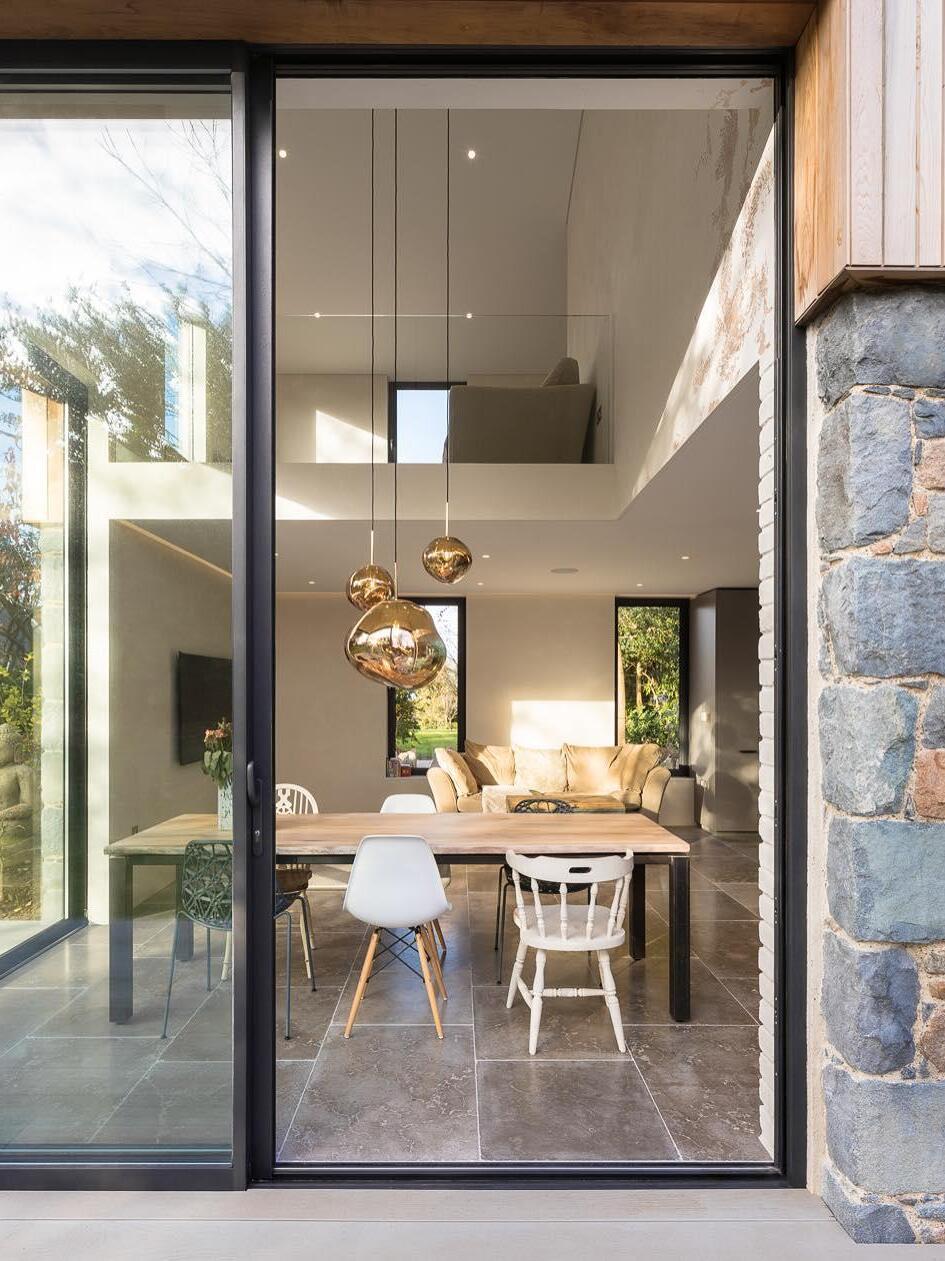 Pendant lighting visible through a glazed doorway