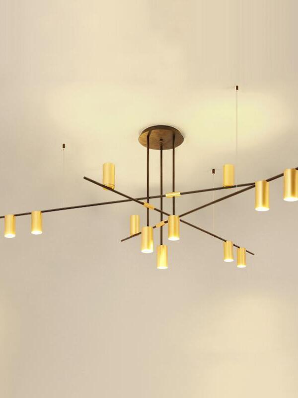 Crossed gold-coloured rods and illuminated small heads