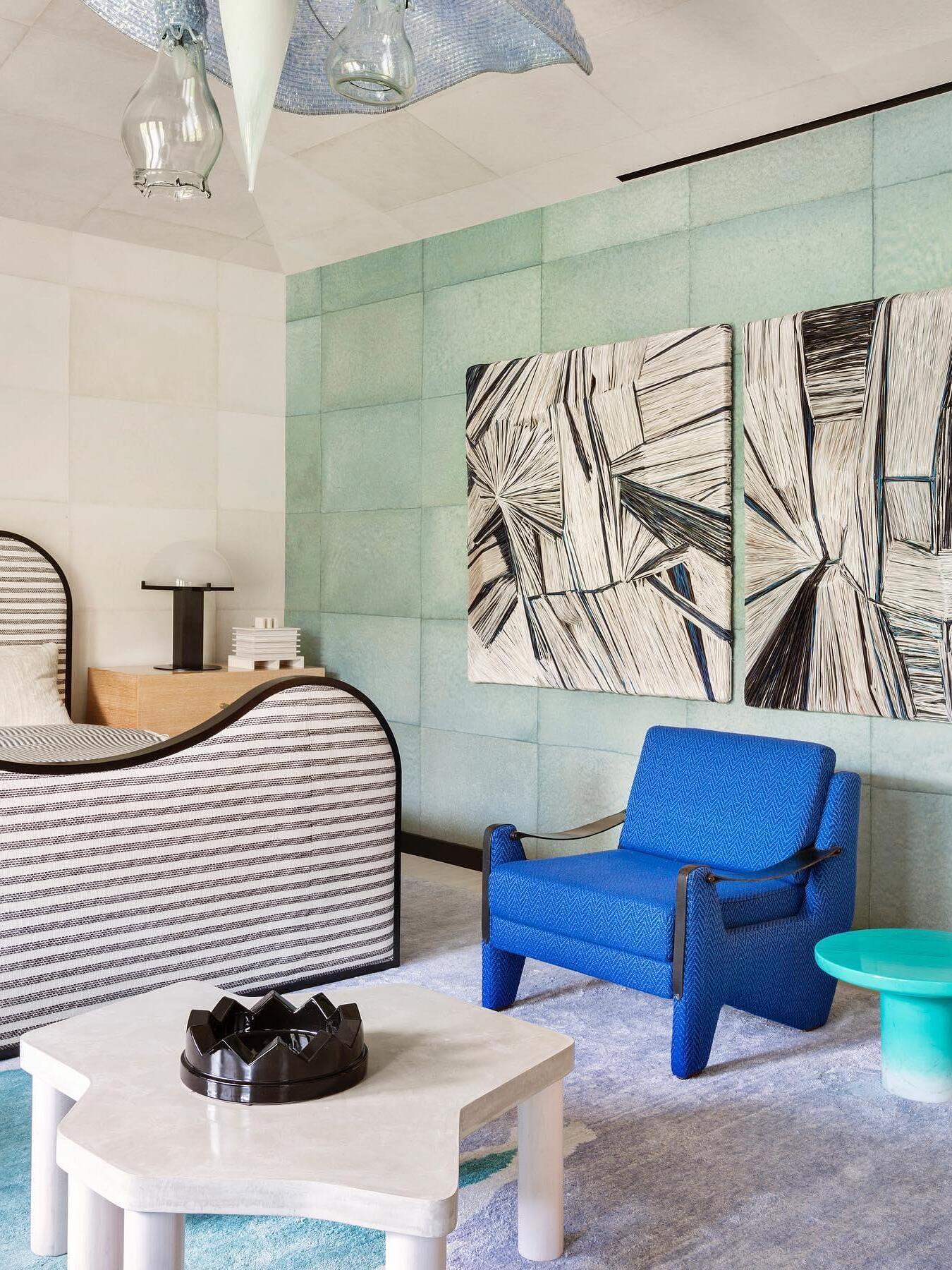 Dome lamp in a room with a blue chair
