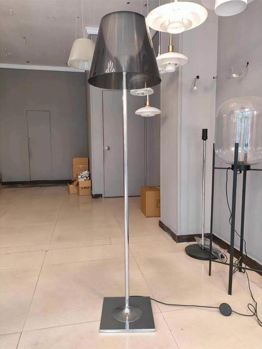 Ktribe dark translucent floor lamp in a lighting showroom