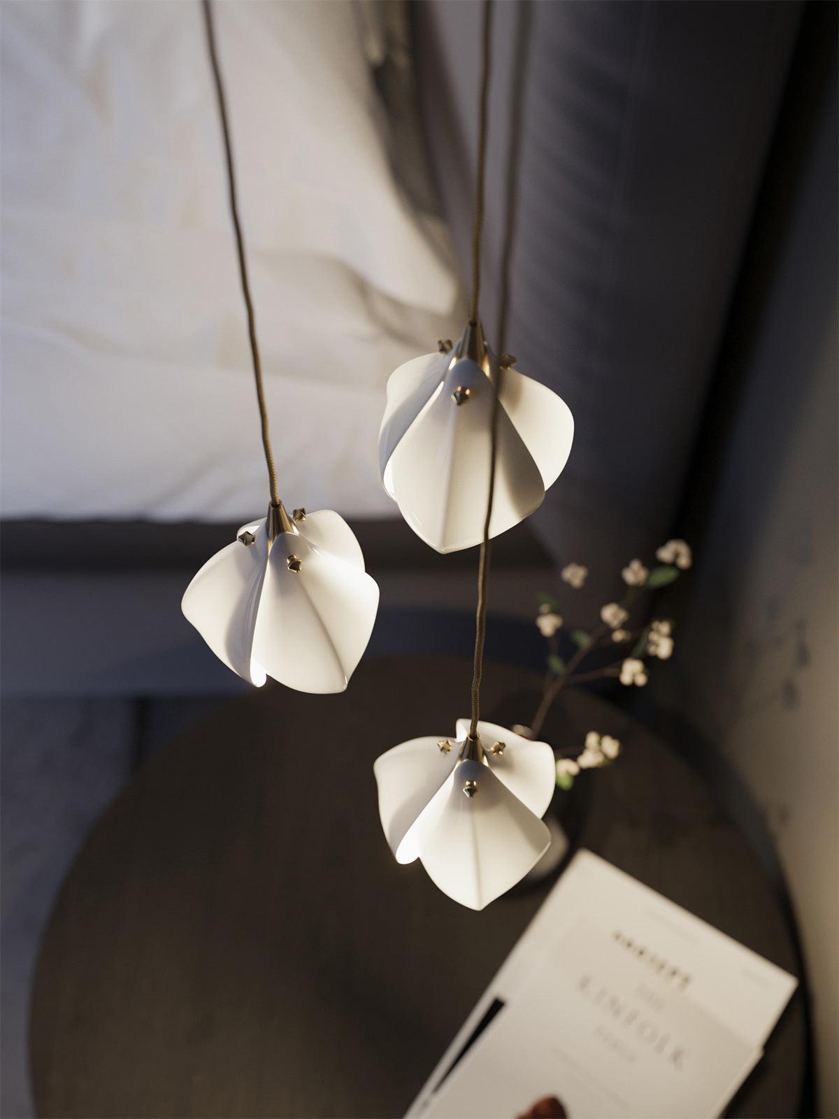 Three petal-shaped lights viewed from below