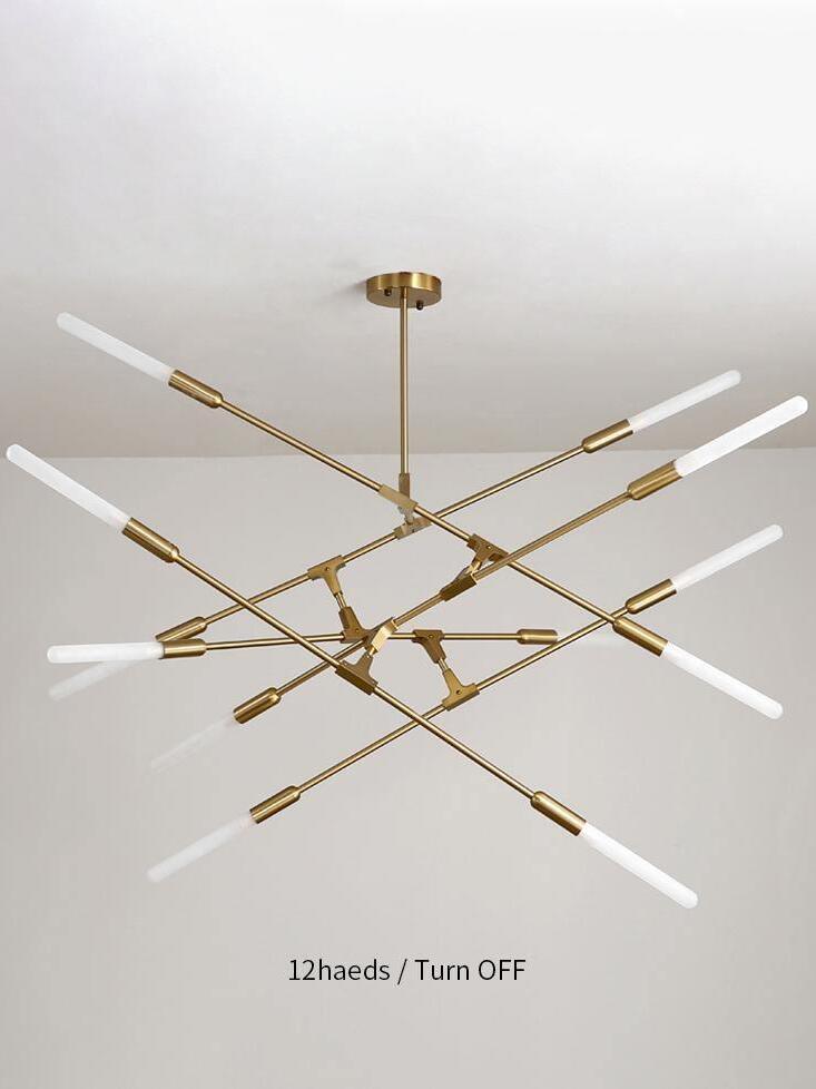 Gold chandelier pictured with twelve-head label and lights off