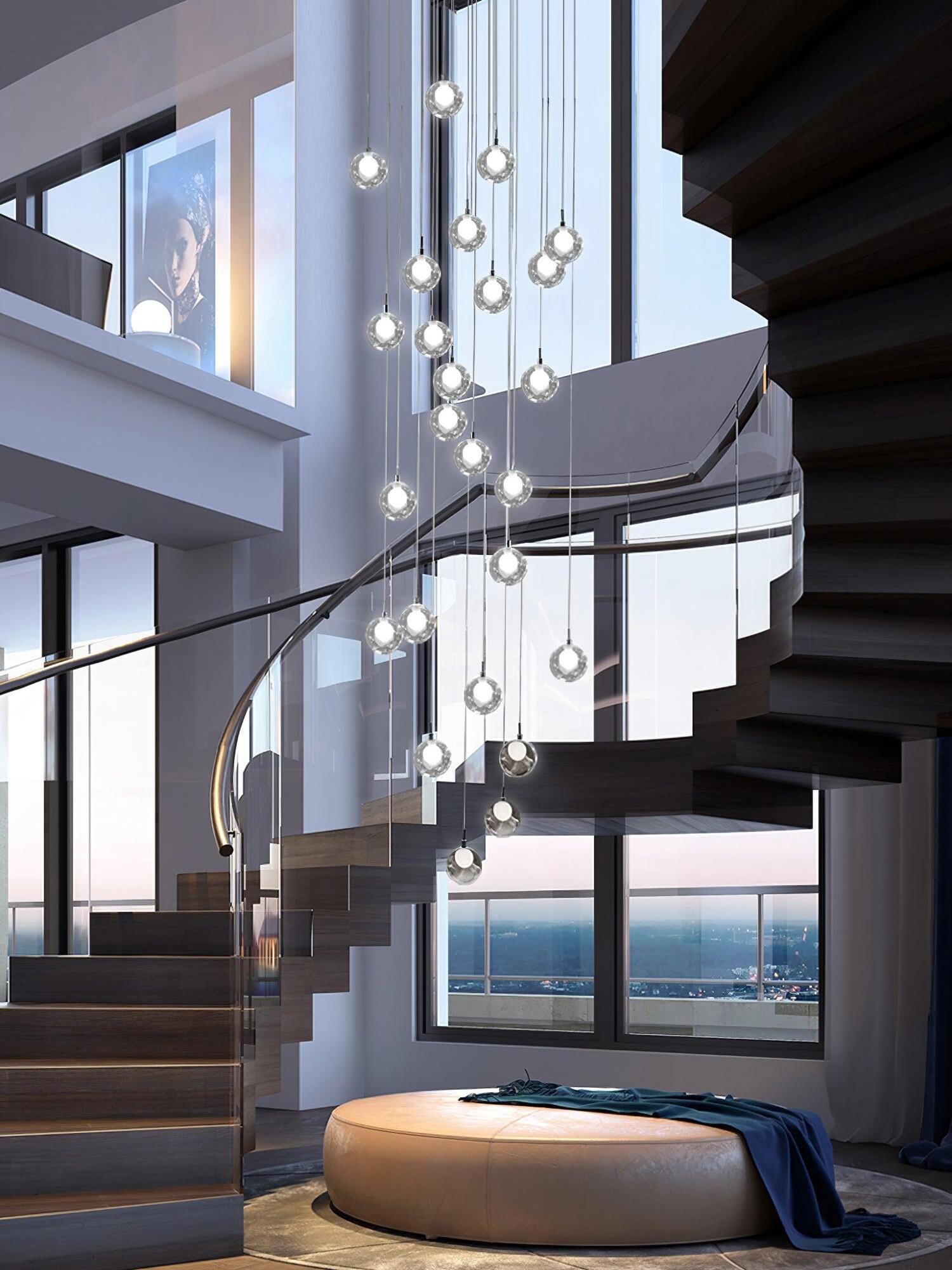 Vertical group of clear globe lights in stairwell