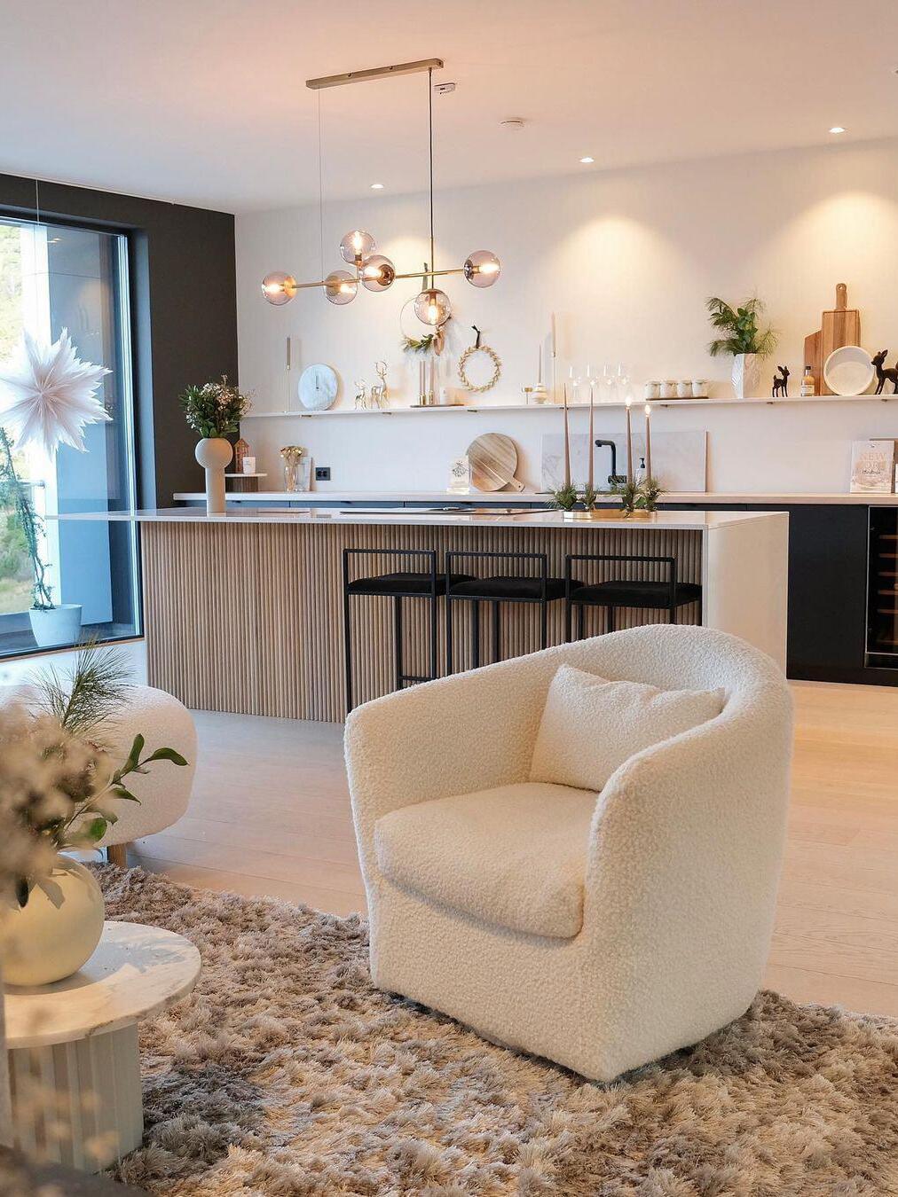 Globe chandelier over a living-room counter