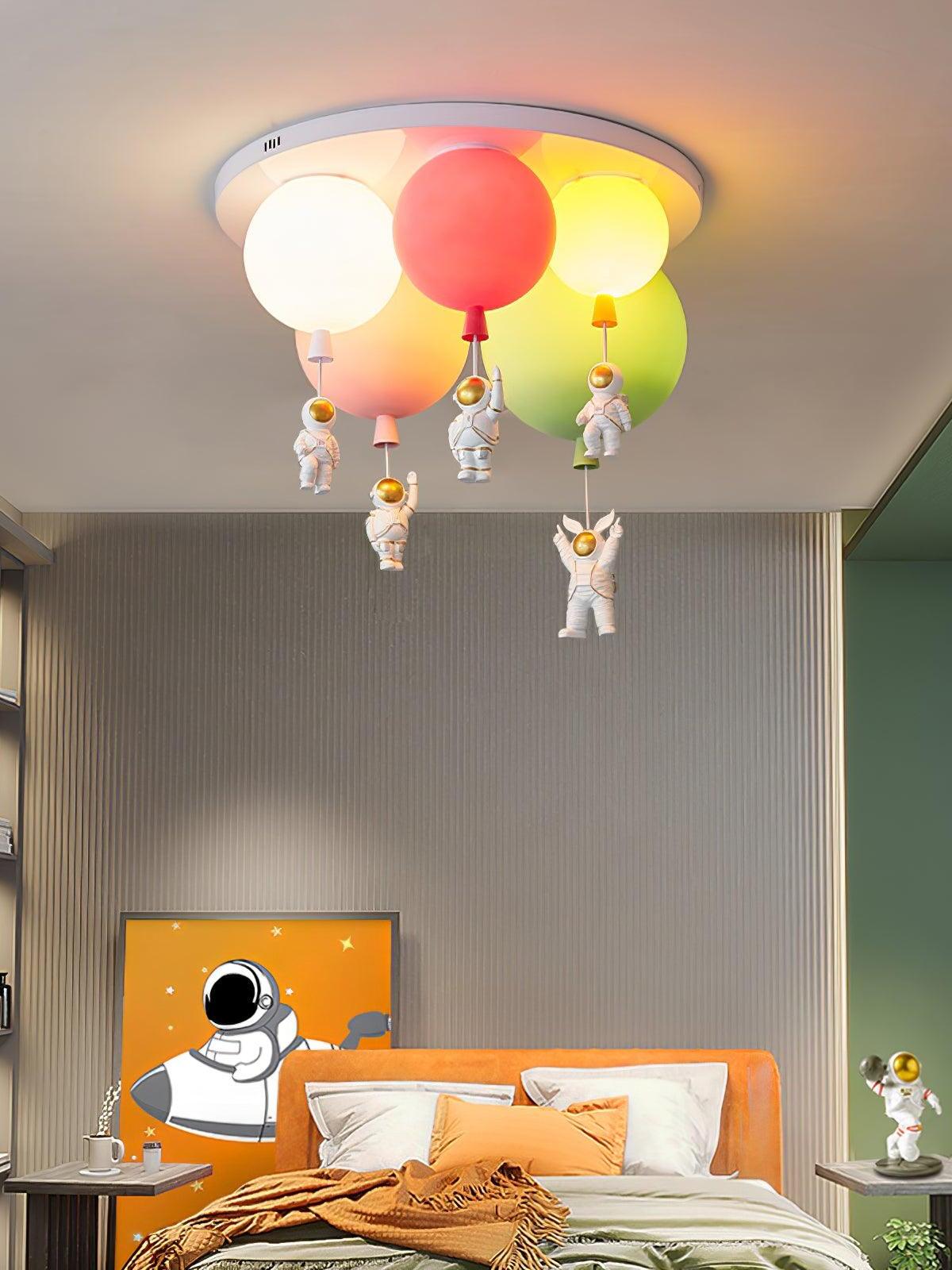 Balloon and astronaut light in a space-themed bedroom